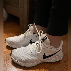 Nikes, normal wear , small stains, size 8 fits like a 7 1/2